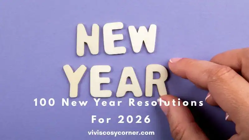 White wooden letters spell 'NEW YEAR' on a purple background; overlay reads '100 New Year Resolutions For 2026' and a site URL.