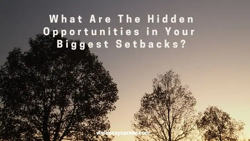 Sunset sky with silhouetted trees and the white text: 'What Are The Hidden Opportunities in Your Biggest Setbacks?' (overlay as the image's message).