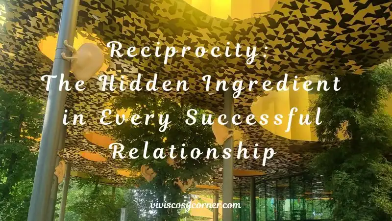 Text over a patterned outdoor canopy reads: 'Reciprocity: The Hidden Ingredient in Every Successful Relationship' with trees and a modern building in the background.