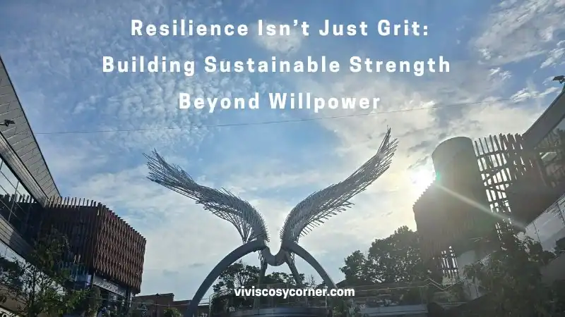 Outdoor view of a metal winged sculpture against a bright sky, with the overlay text: “Resilience Isn't Just Grit: Building Sustainable Strength Beyond Willpower” and the site viviscos corner.com.