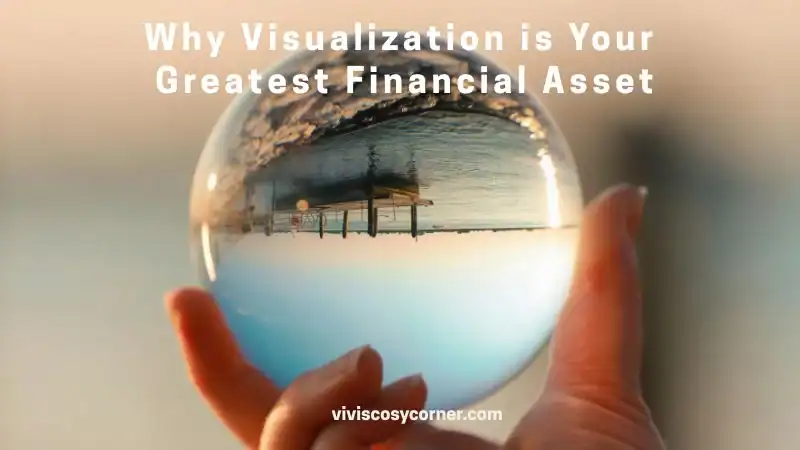 Hand holding a crystal ball that reflects a pier over water, with the headline “Why Visualization is Your Greatest Financial Asset.”